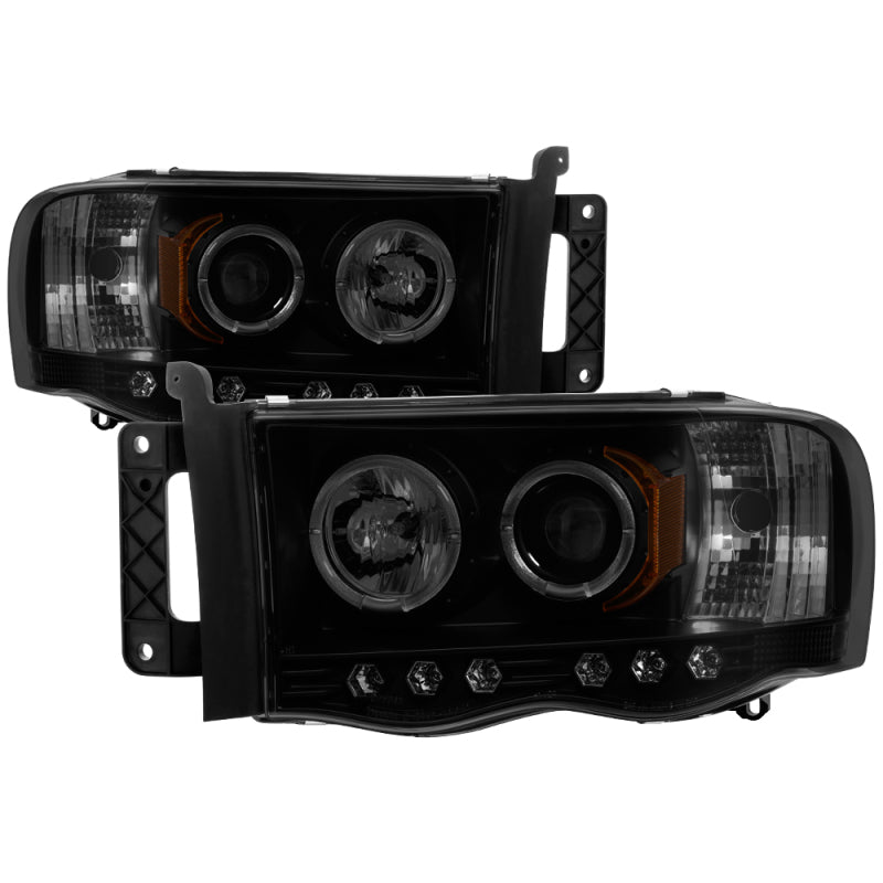 Load image into Gallery viewer, Spyder Dodge Ram 1500 02-05 03-05 Projector Headlights LED Halo LED Blk Smke PRO-YD-DR02-HL-BSM
