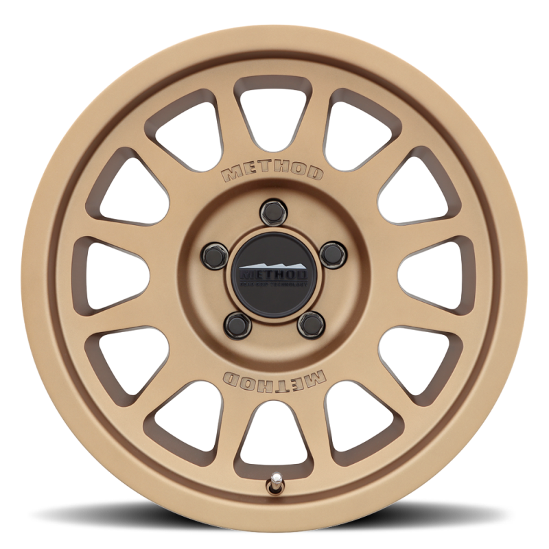 Load image into Gallery viewer, Method MR703 17x8.5 +25mm Offset 5x5 71.5mm CB Method Bronze Wheel
