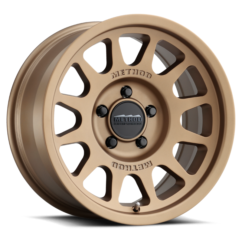 Load image into Gallery viewer, Method MR703 17x8.5 +25mm Offset 5x5 71.5mm CB Method Bronze Wheel
