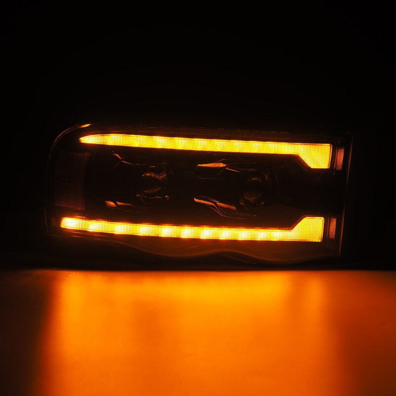 Load image into Gallery viewer, AlphaRex 02-05 Dodge Ram 1500 LUXX LED Proj Headlights Alpha Black w/Activ Light/Seq Signal
