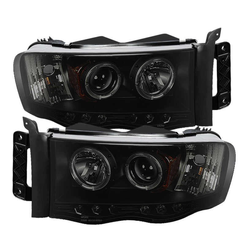 Load image into Gallery viewer, Spyder Dodge Ram 1500 02-05 03-05 Projector Headlights LED Halo LED Blk Smke PRO-YD-DR02-HL-BSM
