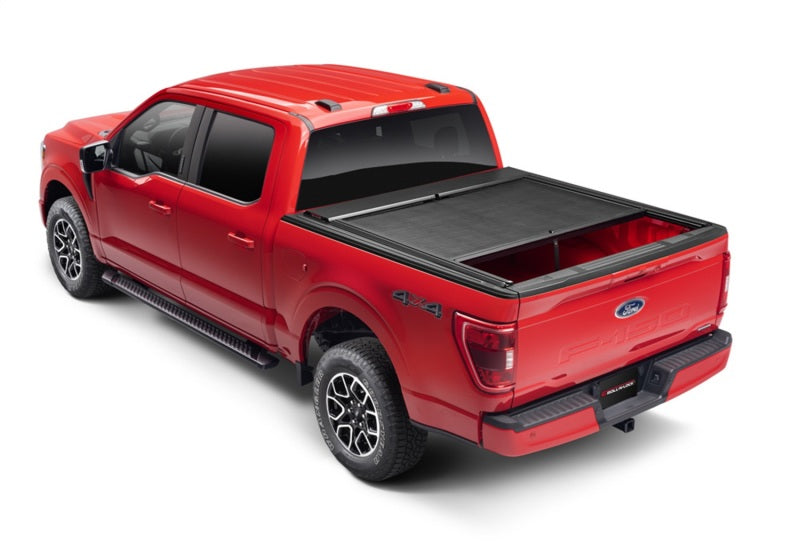Load image into Gallery viewer, Roll-N-Lock 20-22 Chevrolet Silverado 2500-3500 (82.2in. Bed) M-Series XT Retractable Tonneau Cover

