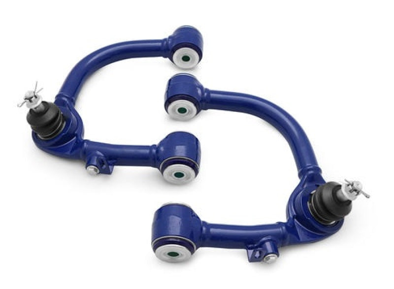 Load image into Gallery viewer, SuperPro Toyota Land Cruiser 100 Series Front Upper Fixed Offset Control Arm Set
