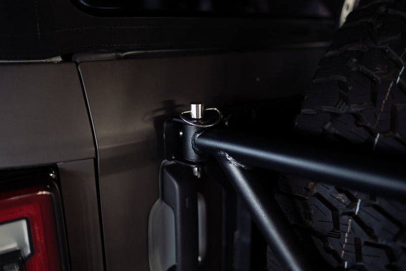 Load image into Gallery viewer, DV8 Offroad 21-23 Ford Bronco Spare Tire Guard &amp; Accessory Mount
