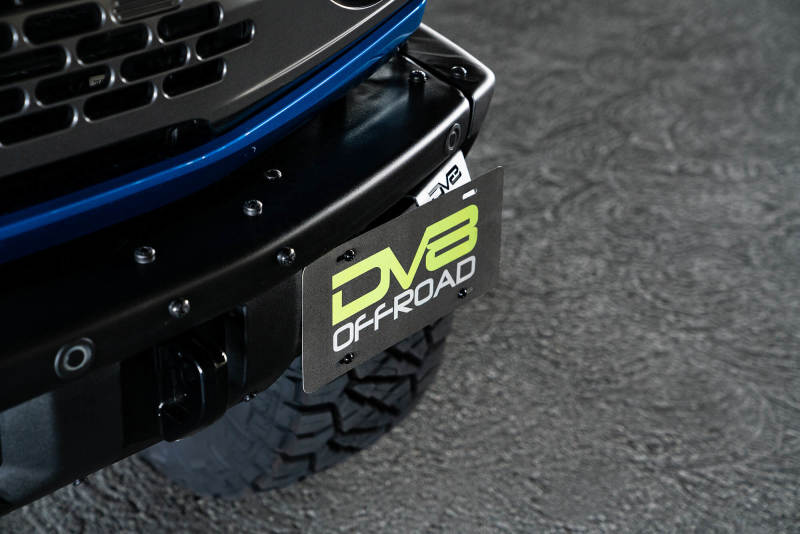 Load image into Gallery viewer, DV8 Offroad 21-22 Ford Bronco Factory Front Bumper License Relocation Bracket - Side
