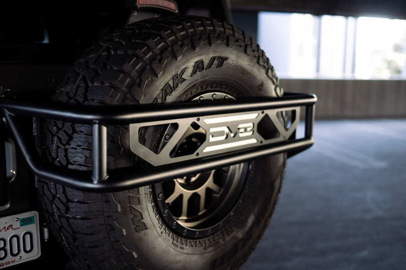 Load image into Gallery viewer, DV8 Offroad 21-23 Ford Bronco Spare Tire Guard &amp; Accessory Mount
