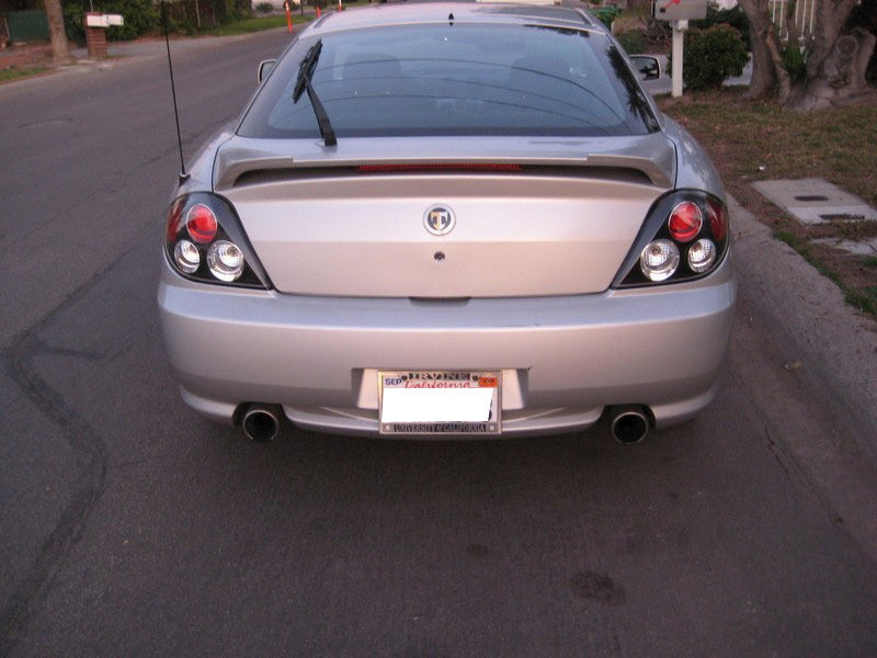Load image into Gallery viewer, Spyder Hyundai Tiburon 03-05 Euro Style Tail Lights Black ALT-YD-HYT03-BK
