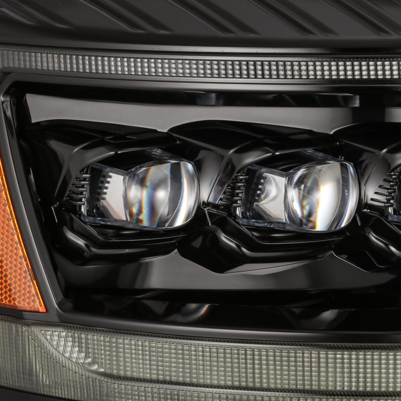 Load image into Gallery viewer, AlphaRex 06-08 Ram 1500HD NOVA LED Proj Headlights Plnk Style Alpha Blk w/Seq Signal/DRL/Amber LED
