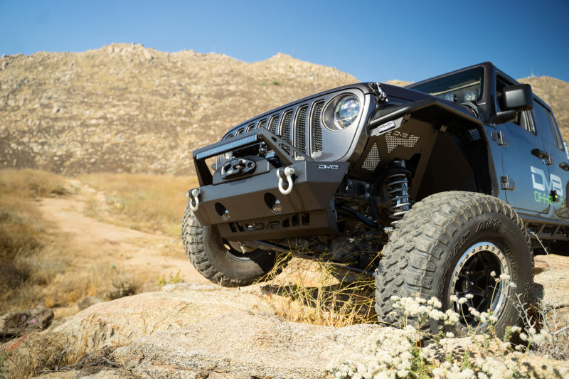Load image into Gallery viewer, DV8 Offroad 18-23 Jeep Wrangler JL/JT Front Bumper Sway-Bar Disconnect Motor Skid Plate
