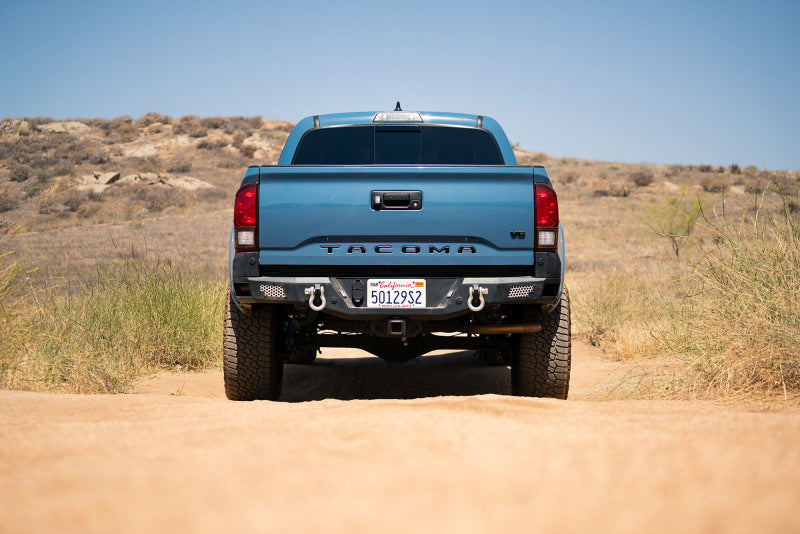 Load image into Gallery viewer, DV8 Offroad 16-23 Toyota Tacoma MTO Series Rear Bumper
