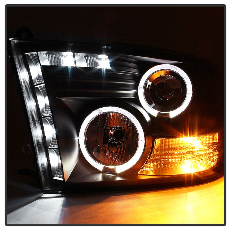 Load image into Gallery viewer, Spyder Dodge Ram 1500 09-14 10-14 Projector Headlights Halogen- LED Halo LED - Blk PRO-YD-DR09-HL-BK
