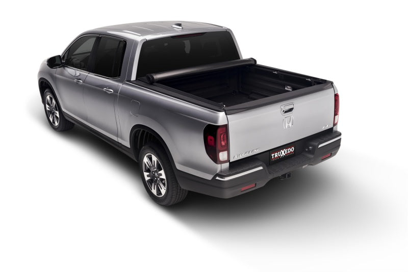 Load image into Gallery viewer, Truxedo 19-20 Ram 1500 (New Body) w/o Multifunction Tailgate 5ft 7in Lo Pro Bed Cover
