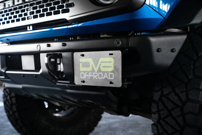 Load image into Gallery viewer, DV8 Offroad 21-22 Ford Bronco Factory Front Bumper License Relocation Bracket - Side
