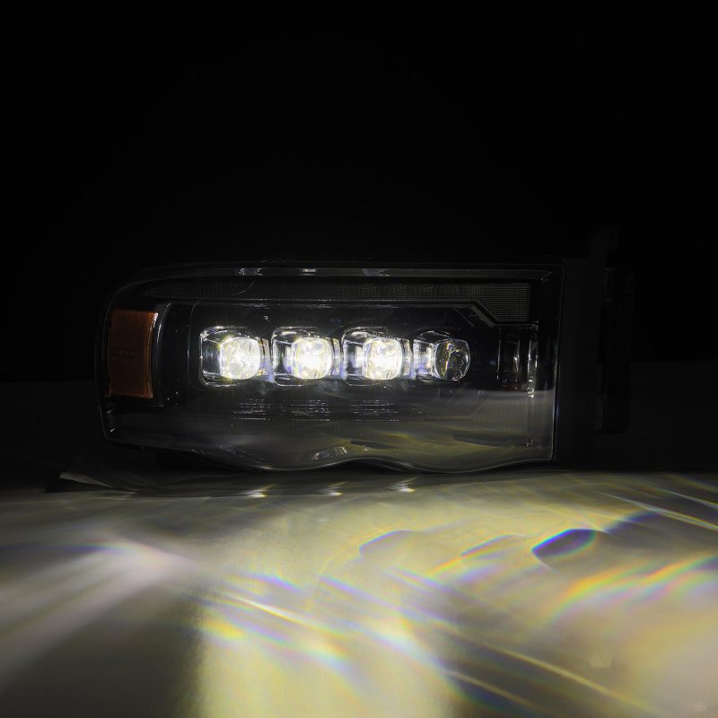 Load image into Gallery viewer, AlphaRex 02-05 Dodge Ram 1500 NOVA LED Proj Headlights Alpha Black w/Activ Light/Seq Signal
