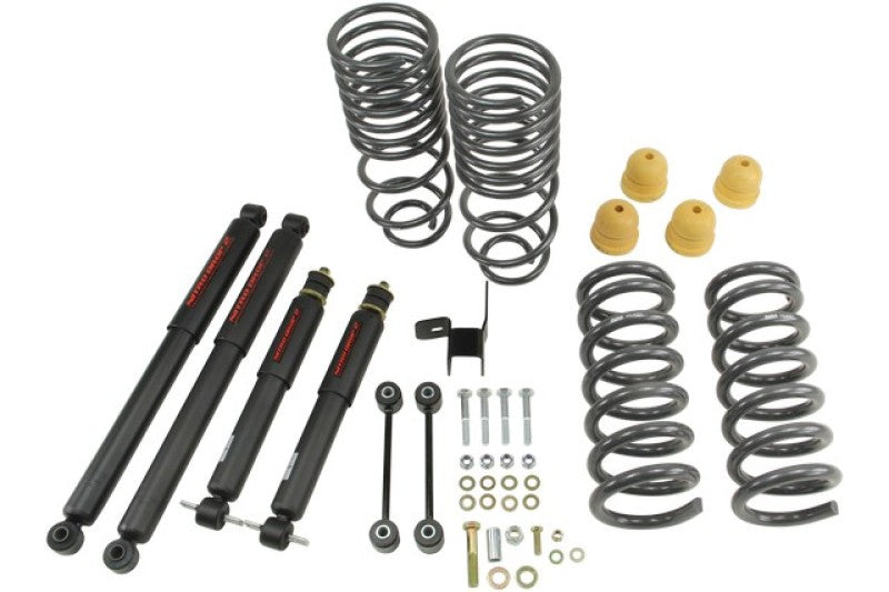 Load image into Gallery viewer, Belltech 09-13 Dodge Ram 1500 Std Cab Lowering Kit w/ND II Shocks - 2in F/4in R Drop
