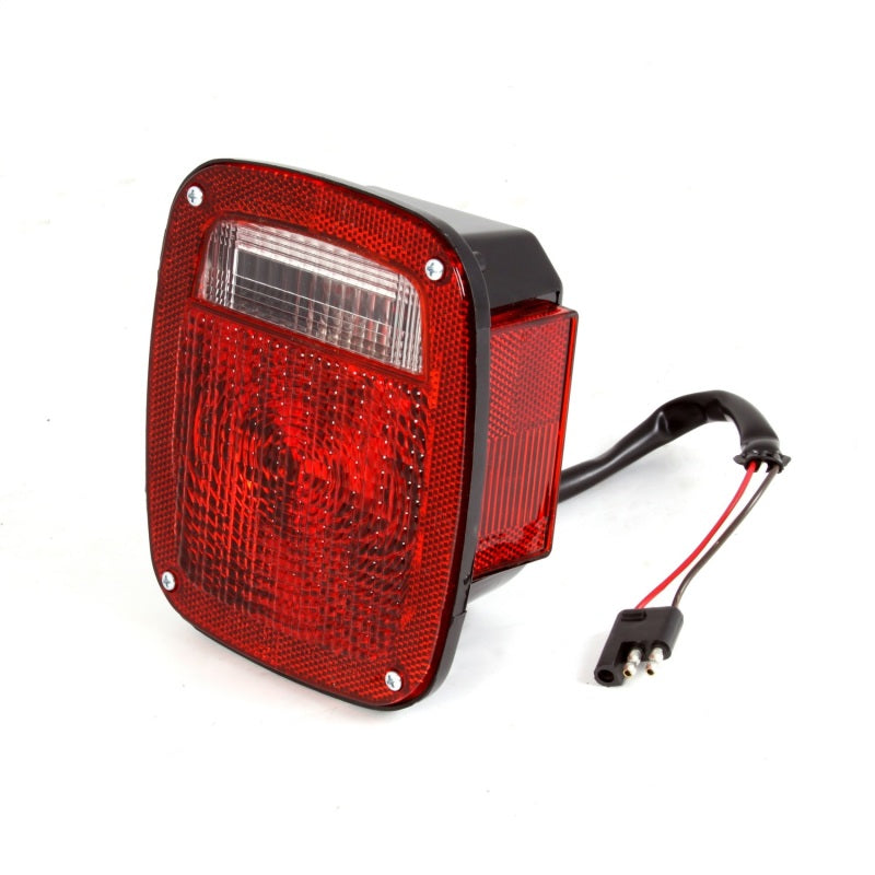 Load image into Gallery viewer, Omix Right Black Tail Lamp 81-86 Jeep CJ Models
