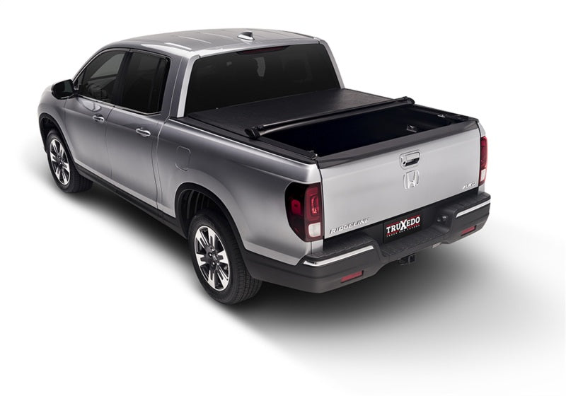 Load image into Gallery viewer, Truxedo 19-20 Ram 1500 (New Body) w/o Multifunction Tailgate 5ft 7in Lo Pro Bed Cover
