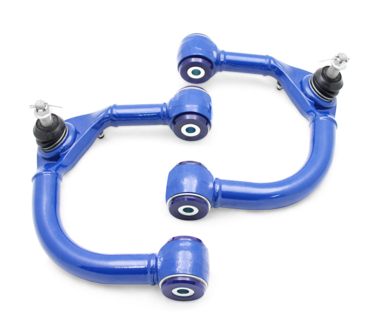 Load image into Gallery viewer, SuperPro 2005 Toyota Tacoma Pre Runner Front Upper Fixed Offset Control Arm Set
