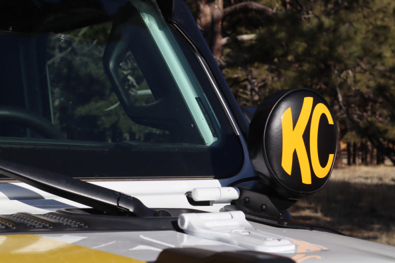 Load image into Gallery viewer, KC HiLiTES 6in. Round Soft Cover (Pair) - Black w/Yellow KC Logo
