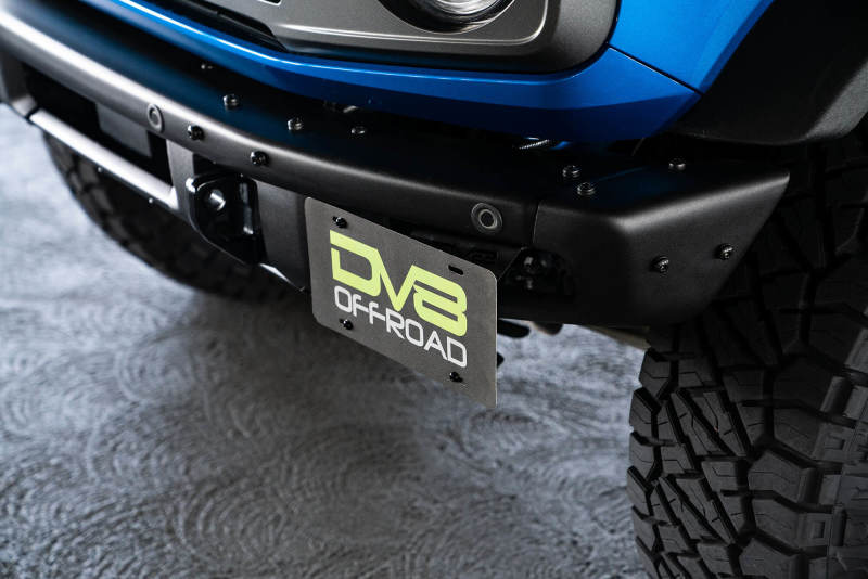 Load image into Gallery viewer, DV8 Offroad 21-22 Ford Bronco Factory Front Bumper License Relocation Bracket - Side
