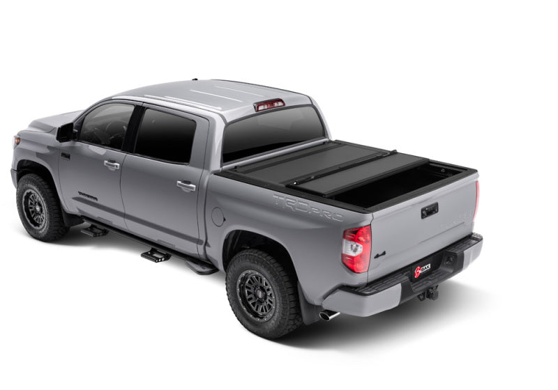 Load image into Gallery viewer, BAK 2022+ Toyota Tundra 5.5ft Bed BAKFlip MX4 Bed Cover
