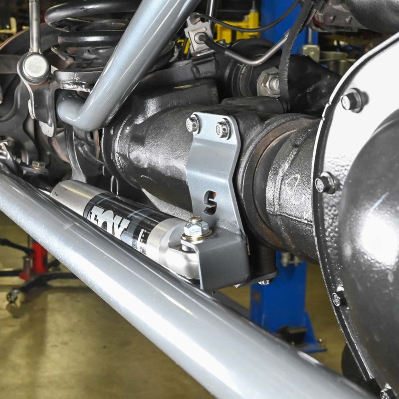 Load image into Gallery viewer, Synergy Ram 13+ Steering Stabilizer Relocation Bracket
