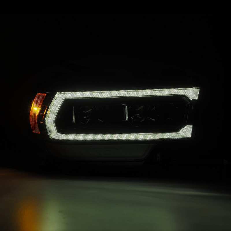 Load image into Gallery viewer, AlphaRex 19-21 Ram 2500 LUXX LED Proj Headlights Plank Style Alpha Blk w/Activ Light/Seq Signal/DRL
