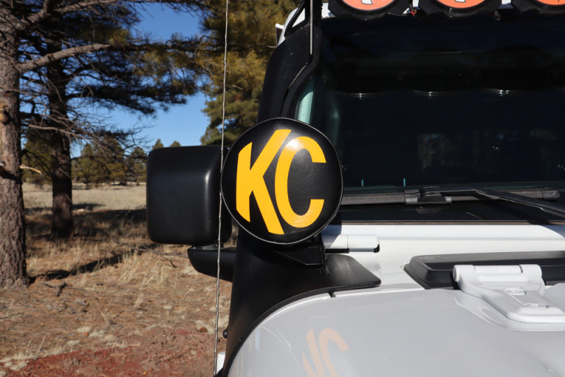 Load image into Gallery viewer, KC HiLiTES 6in. Round Soft Cover (Pair) - Black w/Yellow KC Logo
