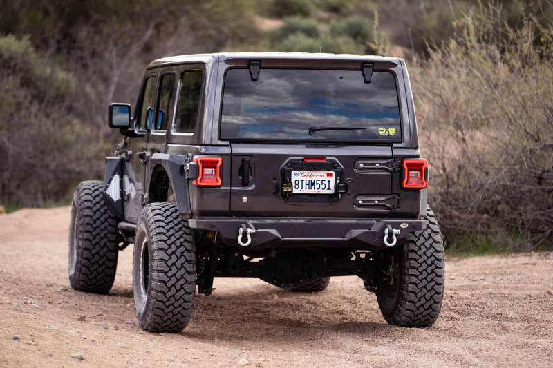 Load image into Gallery viewer, DV8 Offroad 18-22 Jeep Wrangler JL Spare Tire Delete Kit w/Light Mounts

