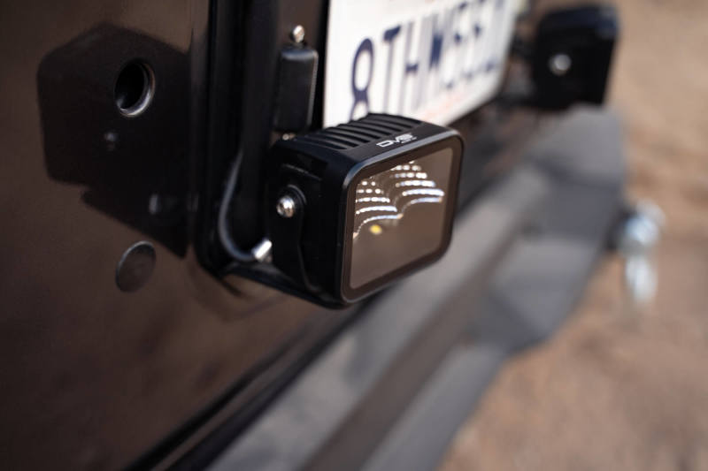 Load image into Gallery viewer, DV8 Offroad 18-22 Jeep Wrangler JL Spare Tire Delete Kit w/Light Mounts
