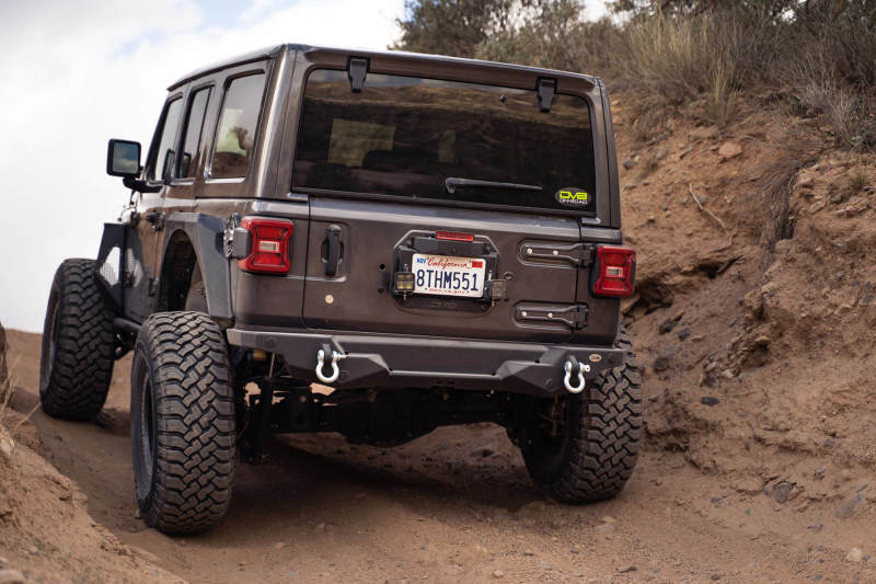 Load image into Gallery viewer, DV8 Offroad 18-22 Jeep Wrangler JL Spare Tire Delete Kit w/Light Mounts
