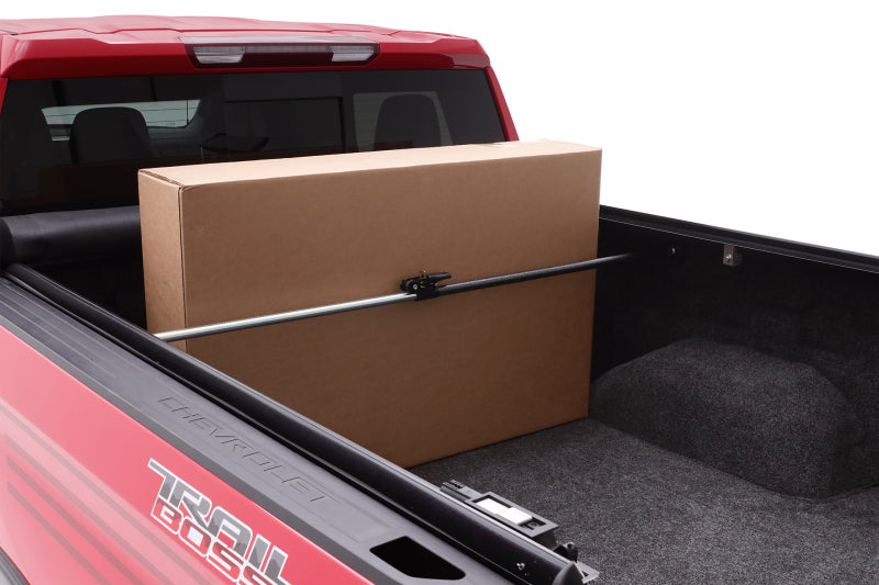 Load image into Gallery viewer, Lund Universal Ratcheting Cargo Bar - Black
