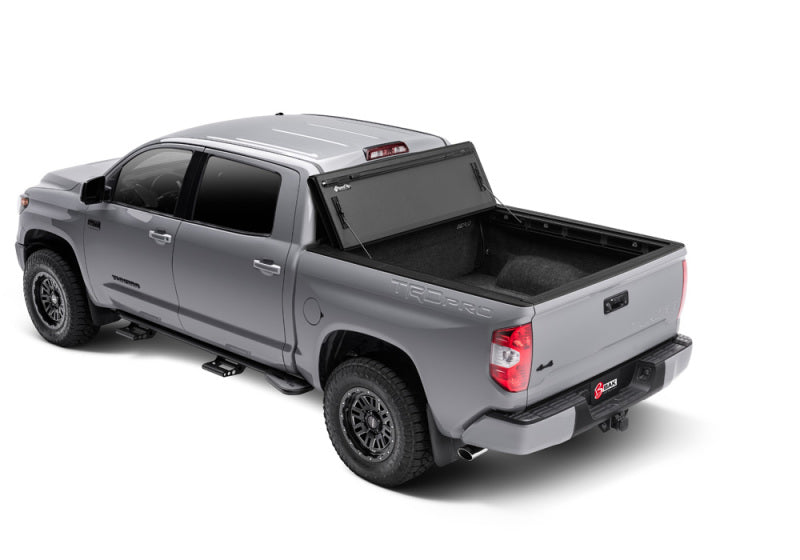 Load image into Gallery viewer, BAK 2022+ Toyota Tundra 5.5ft Bed BAKFlip MX4 Bed Cover

