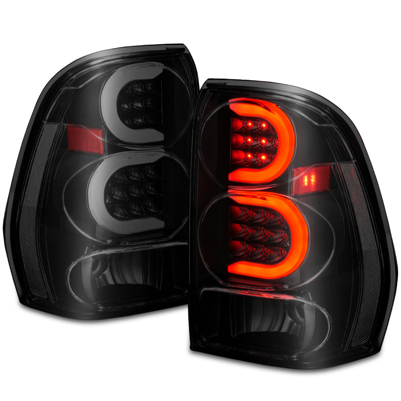 Load image into Gallery viewer, ANZO 2002-2009 Chevrolet Trailblazer LED Tail Lights w/ Light Bar Black Housing Smoke Lens
