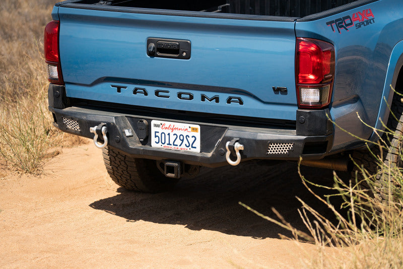 Load image into Gallery viewer, DV8 Offroad 16-23 Toyota Tacoma MTO Series Rear Bumper
