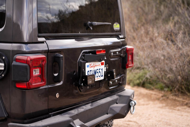 Load image into Gallery viewer, DV8 Offroad 18-22 Jeep Wrangler JL Spare Tire Delete Kit w/Light Mounts
