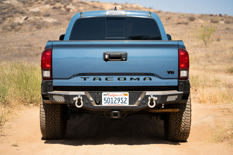 Load image into Gallery viewer, DV8 Offroad 16-23 Toyota Tacoma MTO Series Rear Bumper
