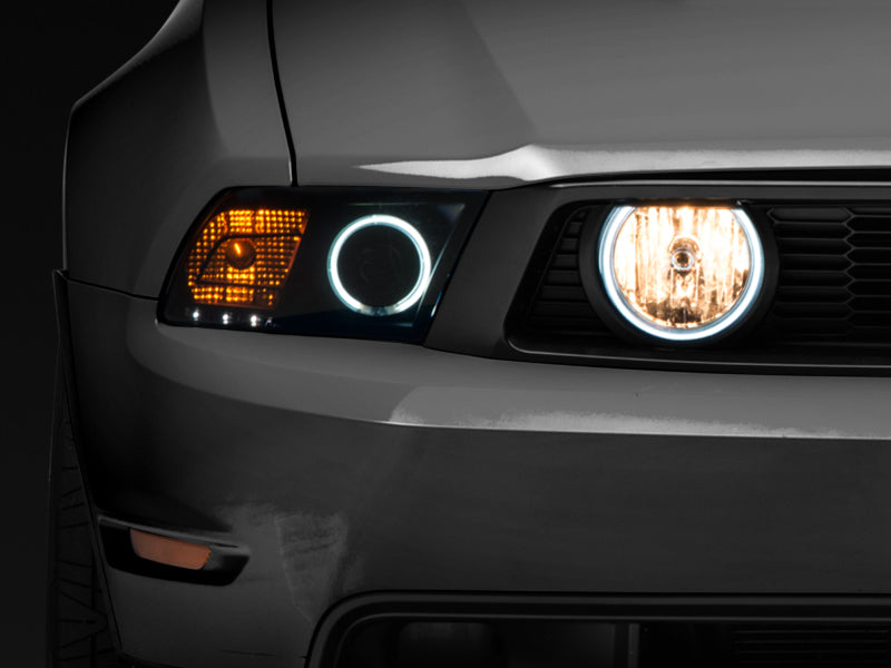 Load image into Gallery viewer, Raxiom 05-12 Ford Mustang GT LED Halo Fog Lights (Smoked)
